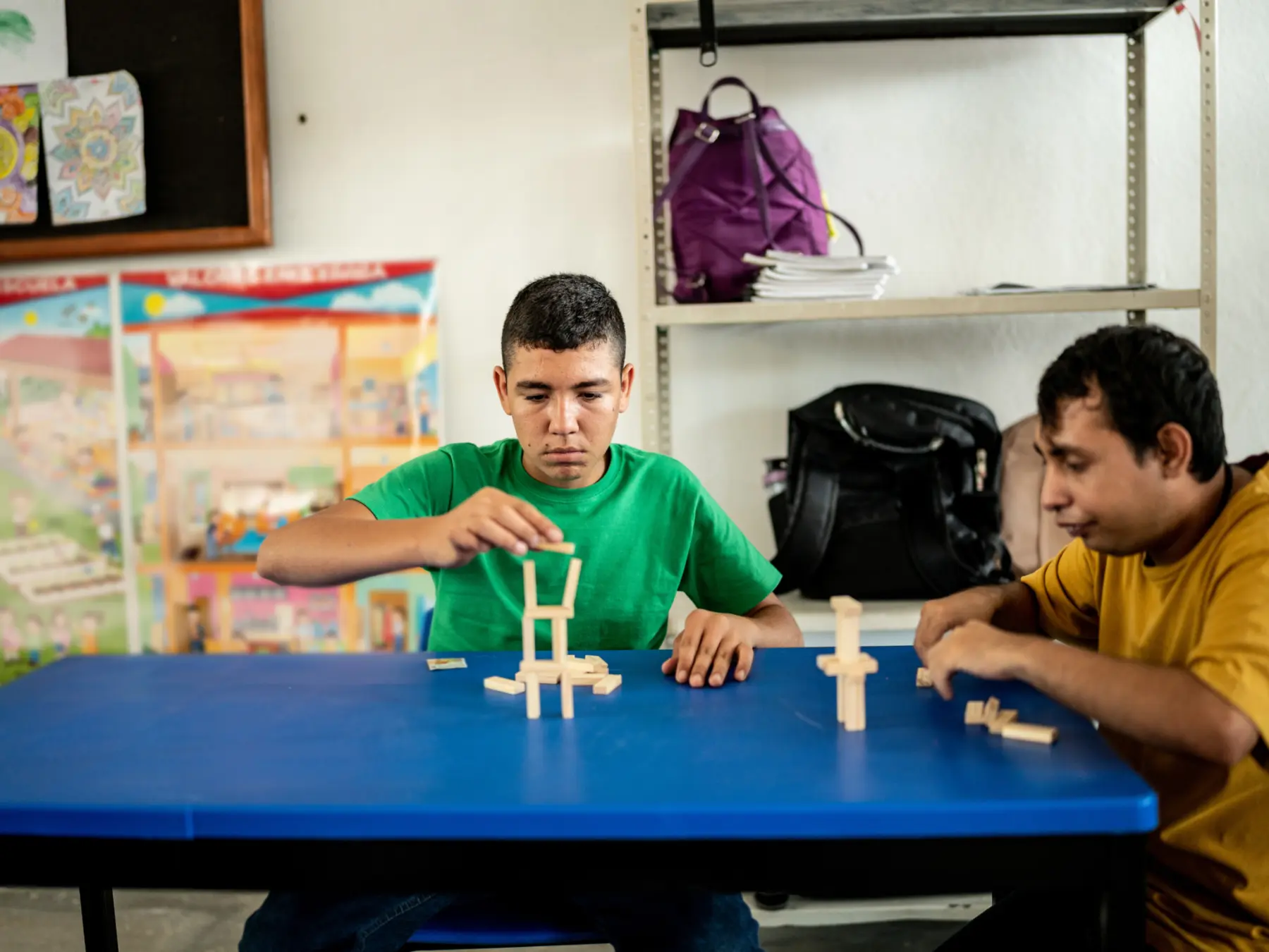 Adults practicing hands-on problem-solving skills together