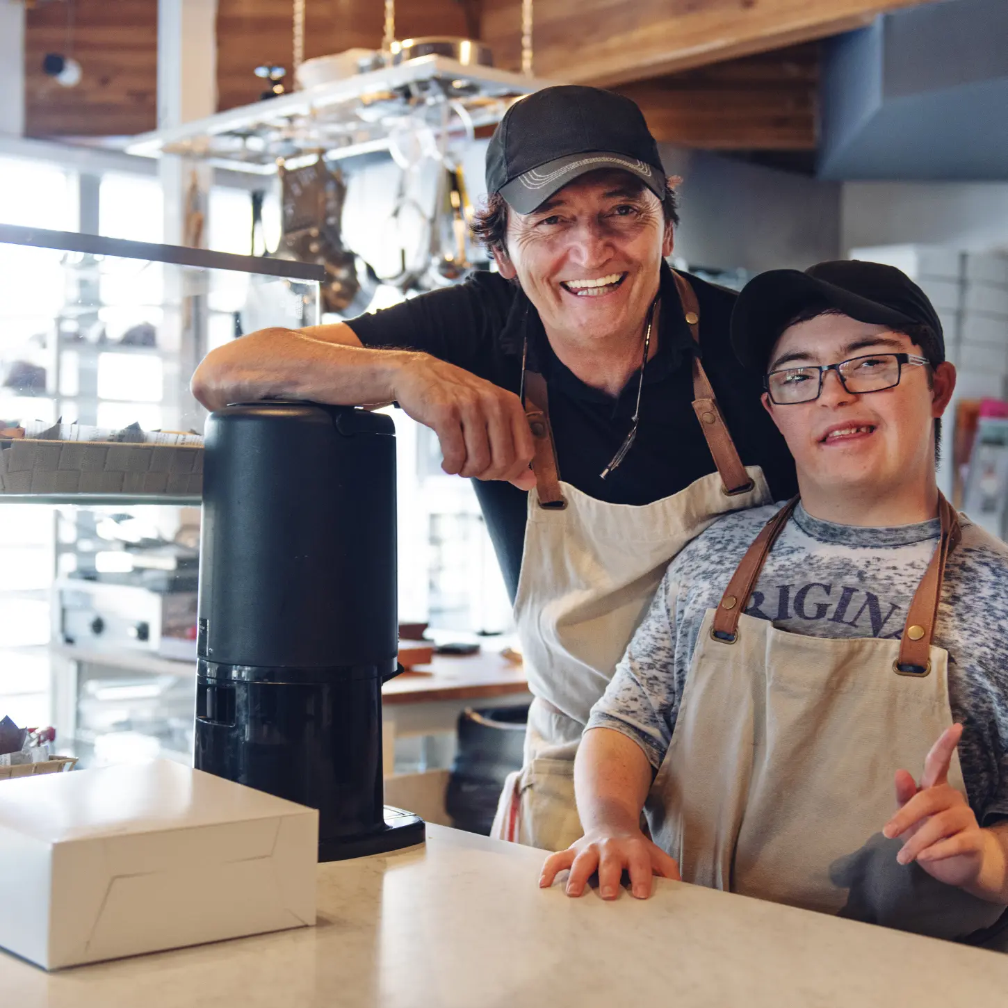 An employee with IDD receiving workplace support in a restaurant